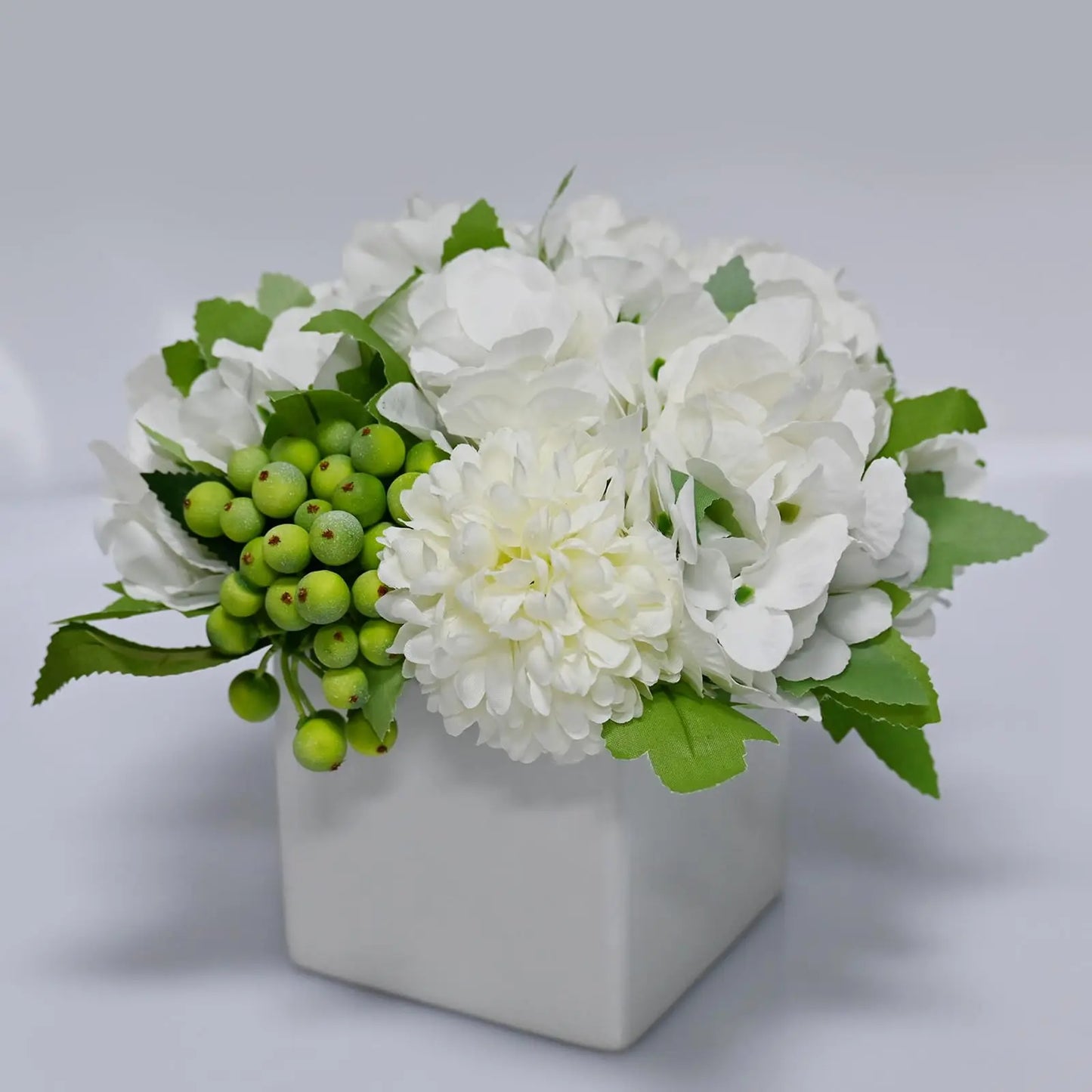 Artificial Flowers in small Ceramic Vase