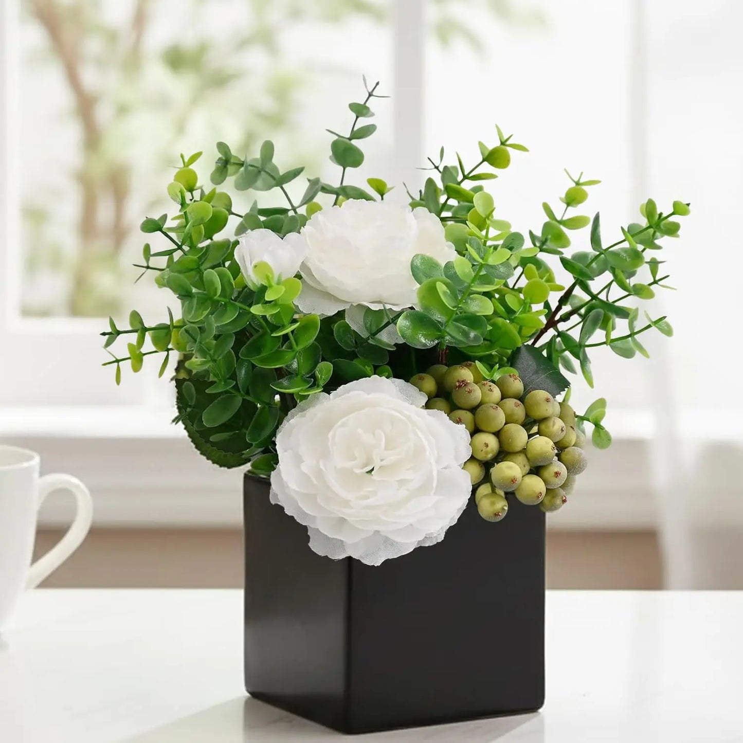 Artificial Flowers in small Ceramic Vase